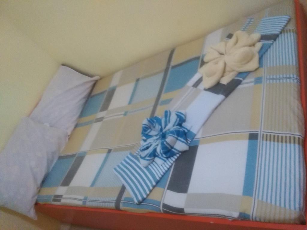 Aranas-Carillo Travellers Inn Kalibo Quarto foto